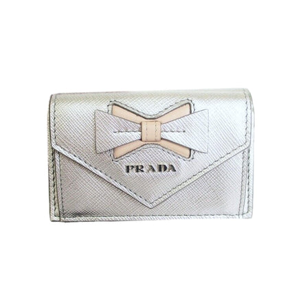 Prada Ribbon Saffiano Metallic Silver and Beige Leather Trifold Wallet available at Queen Bee of Beverly Hills