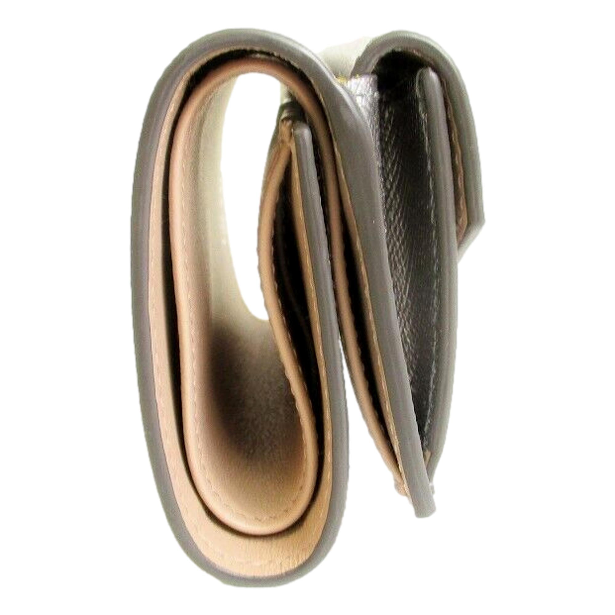 Prada Ribbon Saffiano Metallic Silver and Beige Leather Trifold Wallet available at Queen Bee of Beverly Hills