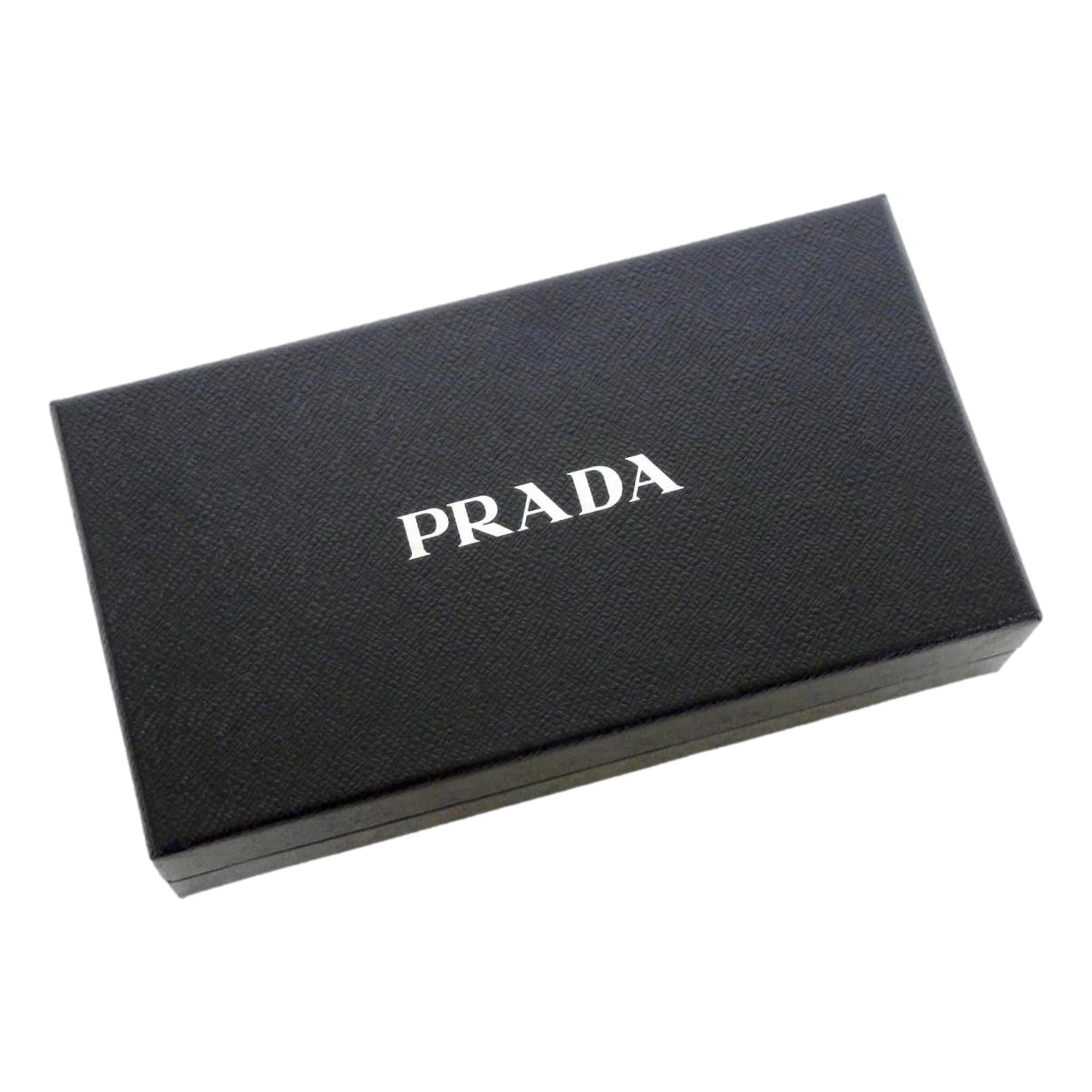 Prada Saffiano Active Black Leather Stripe Zip Around Wallet available at Queen Bee of Beverly Hills