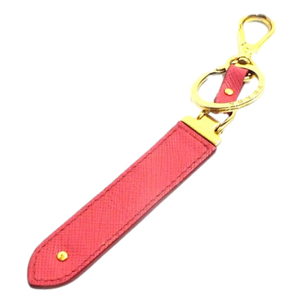 Prada Saffiano Leather Clip Keychain Peony Pink Gold Logo Lettering available at Queen Bee of Beverly Hills