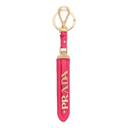 Prada Saffiano Leather Clip Keychain Peony Pink Gold Logo Lettering available at Queen Bee of Beverly Hills