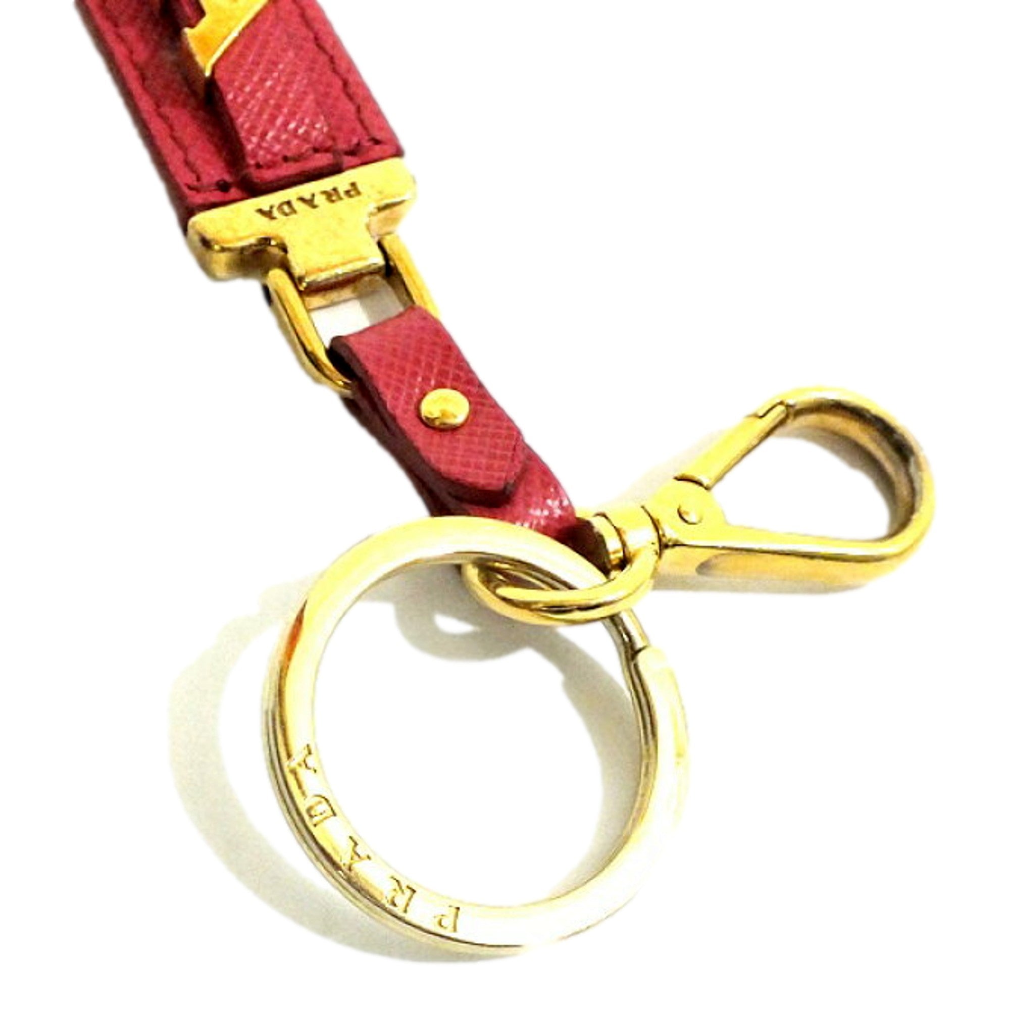 Prada Saffiano Leather Clip Keychain Peony Pink Gold Logo Lettering available at Queen Bee of Beverly Hills