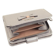 Prada Saffiano Leather Pirite and Cipria Gold Bow Wallet with Zipper Coin Pouch available at Queen Bee of Beverly Hills