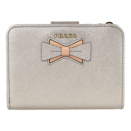 Prada Saffiano Leather Pirite and Cipria Gold Bow Wallet with Zipper Coin Pouch available at Queen Bee of Beverly Hills