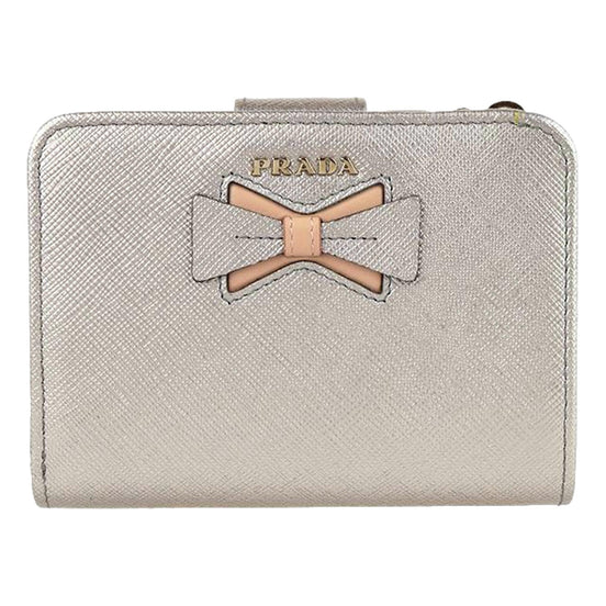 Prada Saffiano Leather Pirite and Cipria Gold Bow Wallet with Zipper Coin Pouch available at Queen Bee of Beverly Hills
