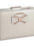 Prada Saffiano Leather Pirite and Cipria Gold Bow Wallet with Zipper Coin Pouch available at Queen Bee of Beverly Hills