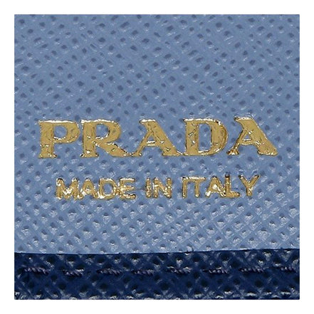 Prada Saffiano Metal Compact Wallet Bluette Blue Multicolor Gold Hardware available at Queen Bee of Beverly Hills