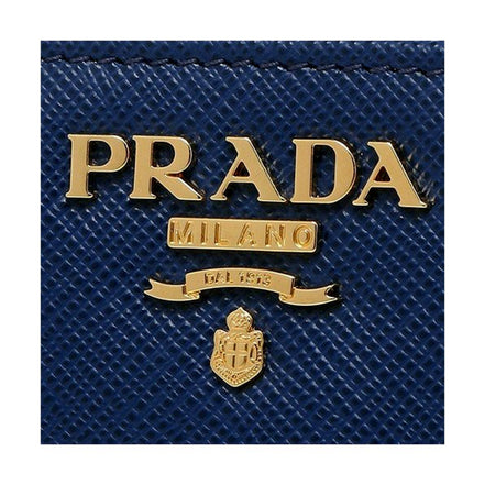 Prada Saffiano Metal Compact Wallet Bluette Blue Multicolor Gold Hardware available at Queen Bee of Beverly Hills