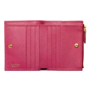 Prada Saffiano Dark Pink Gold Snap Bifold Zip Coin Pocket Wallet sold at Queen Bee of Beverly Hills