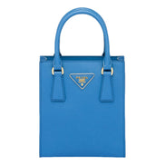 Blue Prada handbag on a white background