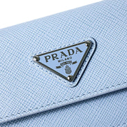 Prada Saffiano Celeste Blue Leather Small Snap Card Holder Wallet Triangle Logo sold at Queen Bee of Beverly Hills
