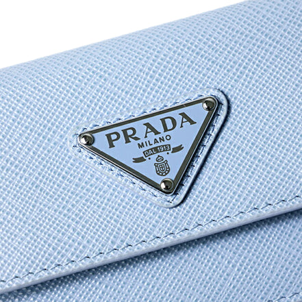 Prada Saffiano Celeste Blue Leather Small Snap Card Holder Wallet Triangle Logo sold at Queen Bee of Beverly Hills