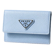 Prada Saffiano Celeste Blue Leather Small Snap Card Holder Wallet Triangle Logo sold at Queen Bee of Beverly Hills