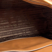 Prada Saffiano Soft Calfskin Top Handle Handbag Medium Caramel Brown available at Queen Bee of Beverly Hills