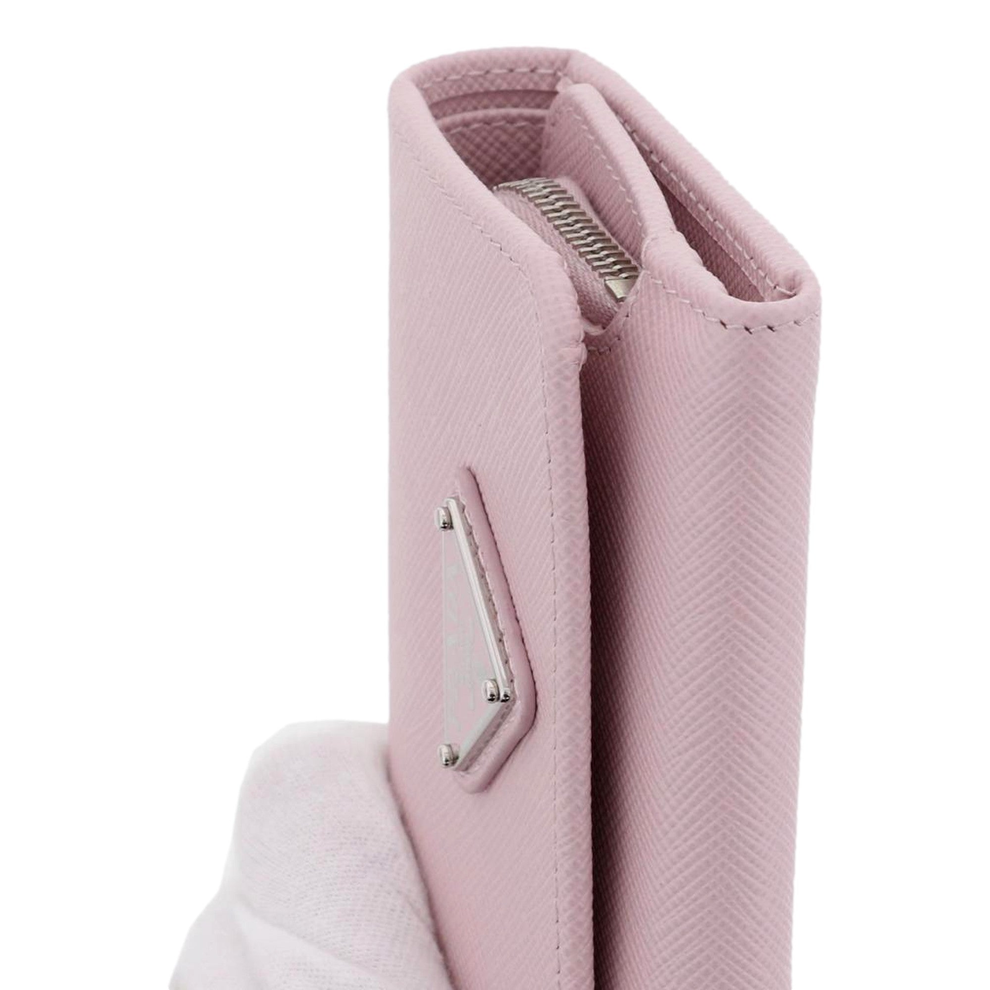 Prada Saffiano Light Pink Leather Wallet Coin Zipper Trifold Triangle Logo sold at Queen Bee of Beverly Hills