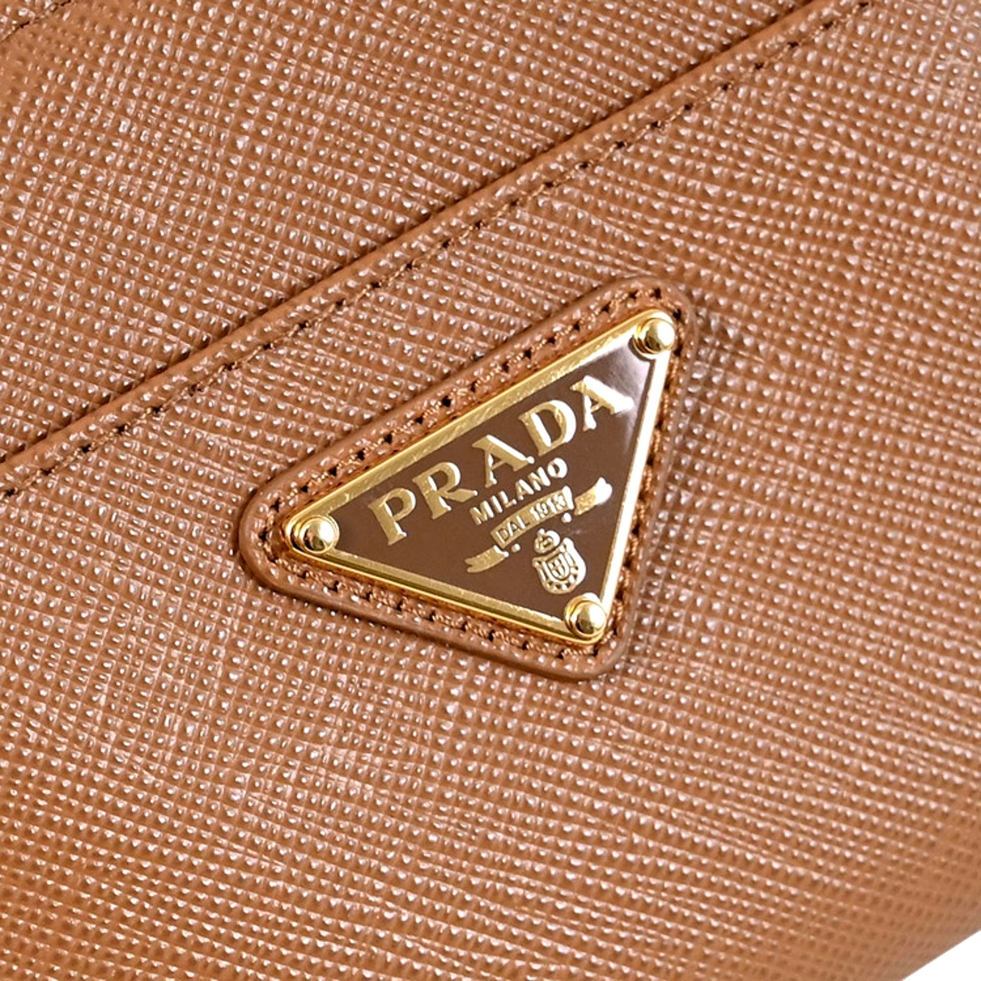 Prada Saffiano Caramel Brown Triangle Logo Zipper Card Holder Wallet sold at Queen Bee of Beverly Hills