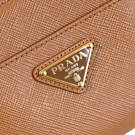 Prada Saffiano Caramel Brown Triangle Logo Zipper Card Holder Wallet sold at Queen Bee of Beverly Hills