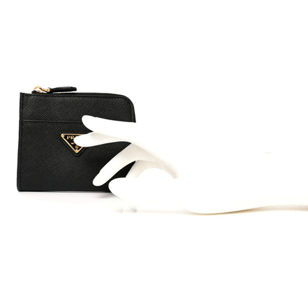 Prada Saffiano Nero Black Triangle Logo Zipper Card Holder Wallet sold at Queen Bee of Beverly Hills