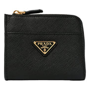 Prada Saffiano Nero Black Triangle Logo Zipper Card Holder Wallet sold at Queen Bee of Beverly Hills