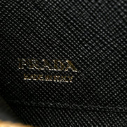 Prada Saffiano Nero Black Triangle Logo Zipper Card Holder Wallet sold at Queen Bee of Beverly Hills