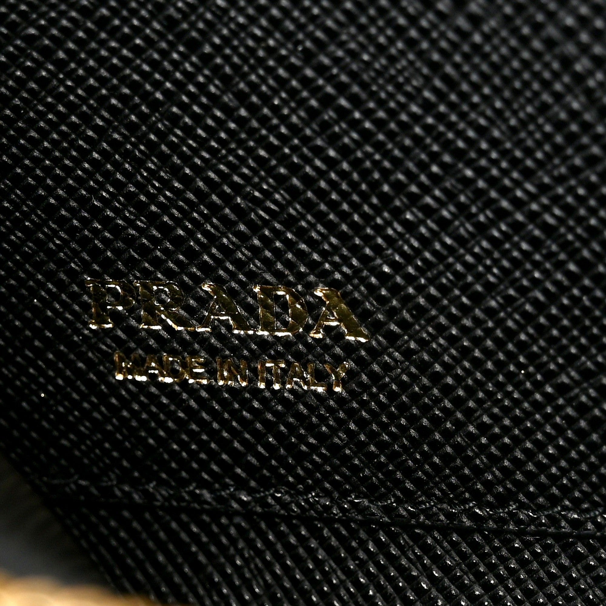 Prada Saffiano Nero Black Triangle Logo Zipper Card Holder Wallet sold at Queen Bee of Beverly Hills