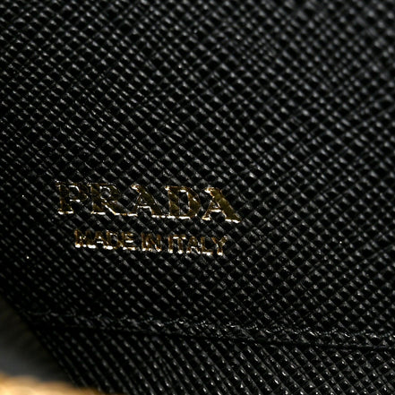 Prada Saffiano Nero Black Triangle Logo Zipper Card Holder Wallet sold at Queen Bee of Beverly Hills