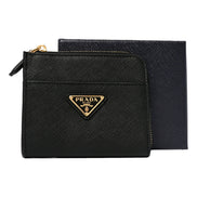 Prada Saffiano Nero Black Triangle Logo Zipper Card Holder Wallet sold at Queen Bee of Beverly Hills