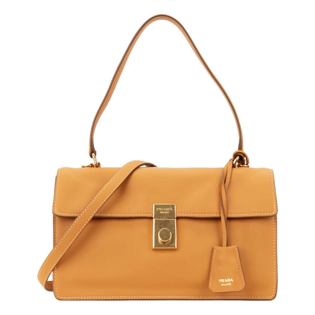 Prada Soft Sound Medium Amber Orange Soft Grain Leather Shoulder Bag available at Queen Bee of Beverly Hills