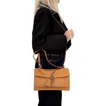 Prada Soft Sound Medium Amber Orange Soft Grain Leather Shoulder Bag available at Queen Bee of Beverly Hills