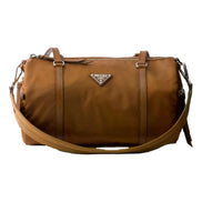 Prada Small Re-Nylon and Saffiano Leather Duffel Bag Brown - available at Queen Bee of Beverly Hills. 