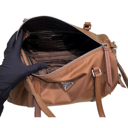 Prada Small Re-Nylon and Saffiano Leather Duffel Bag Brown - available at Queen Bee of Beverly Hills. 