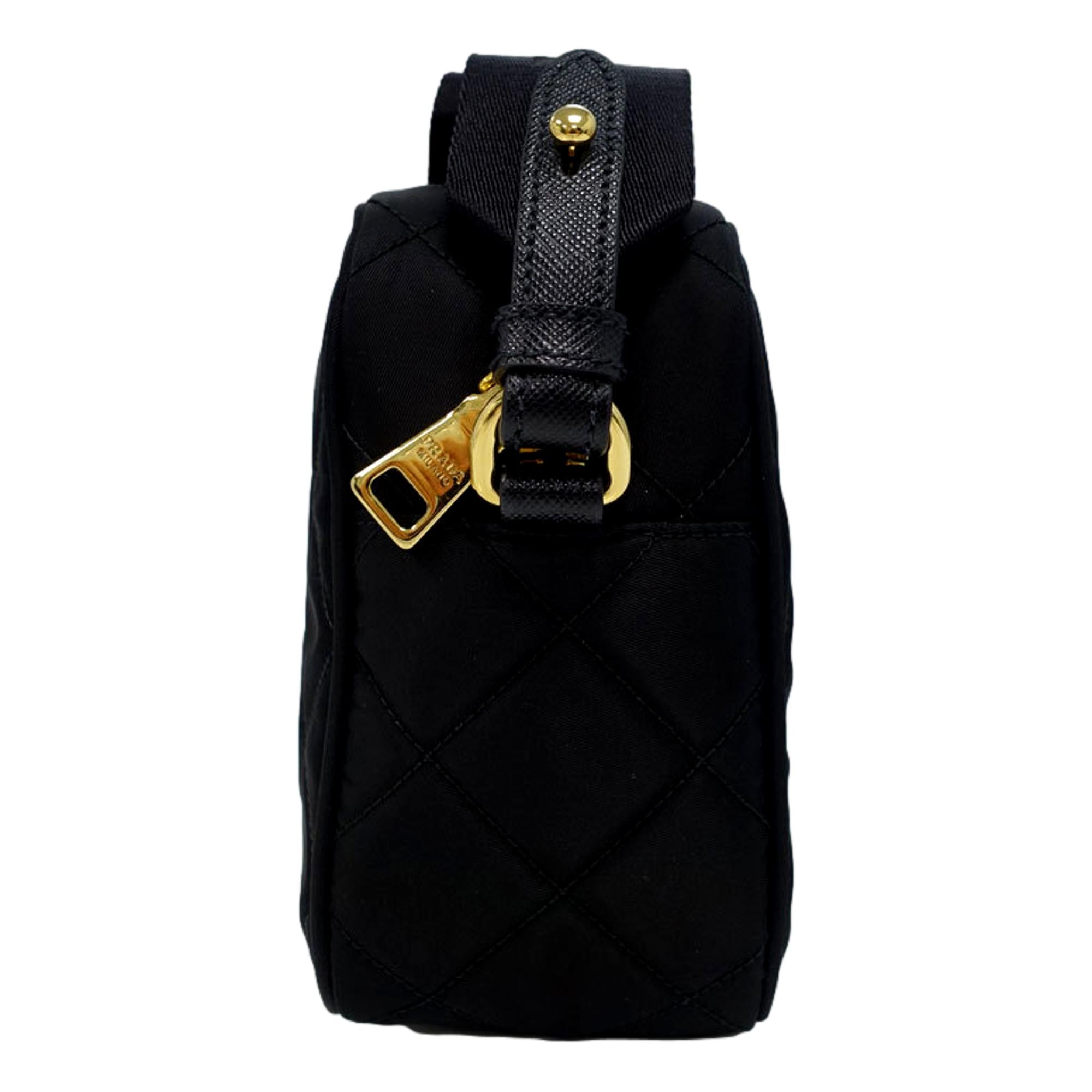 Prada Tessuto Black Quilted Nylon Triangle Logo Camera Crossbody Bag available at Queen Bee of Beverly Hills