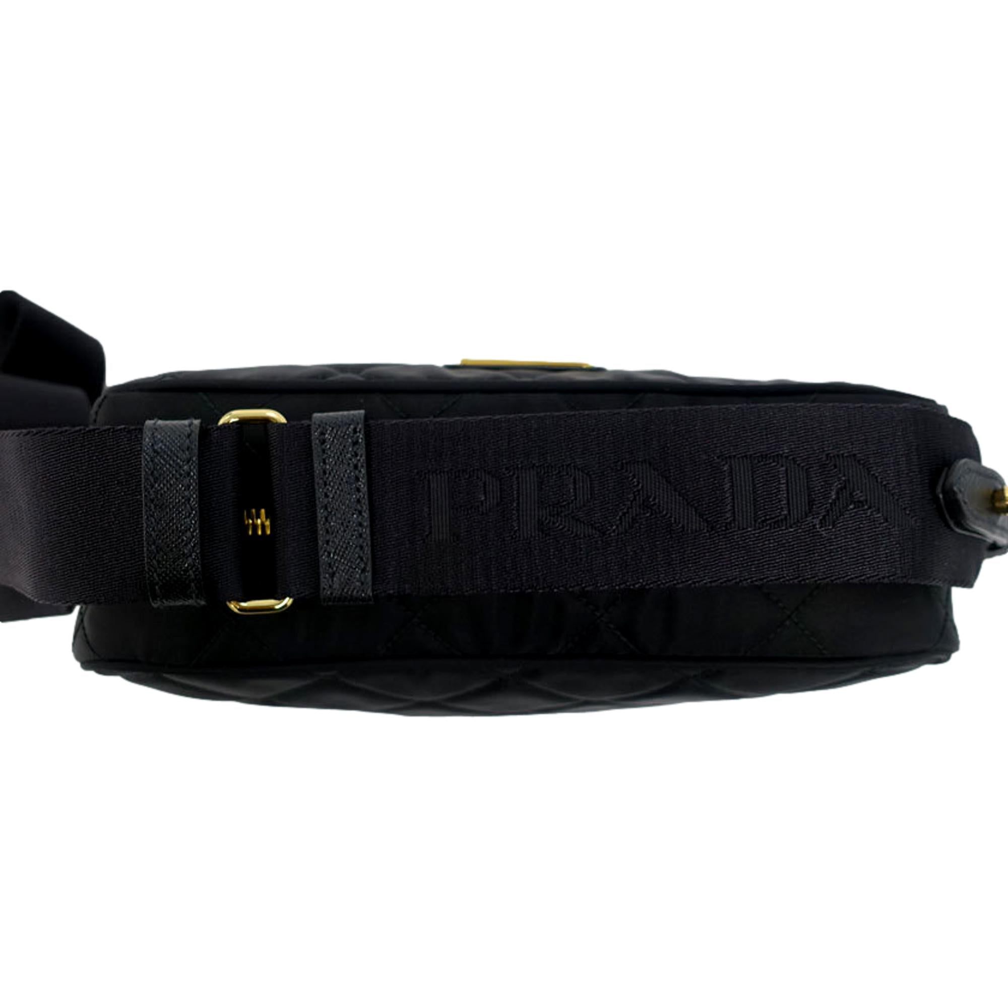 Prada Tessuto Black Quilted Nylon Triangle Logo Camera Crossbody Bag available at Queen Bee of Beverly Hills