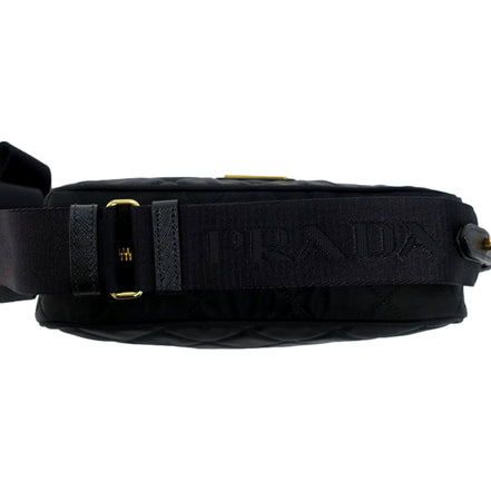 Prada Tessuto Black Quilted Nylon Triangle Logo Camera Crossbody Bag available at Queen Bee of Beverly Hills
