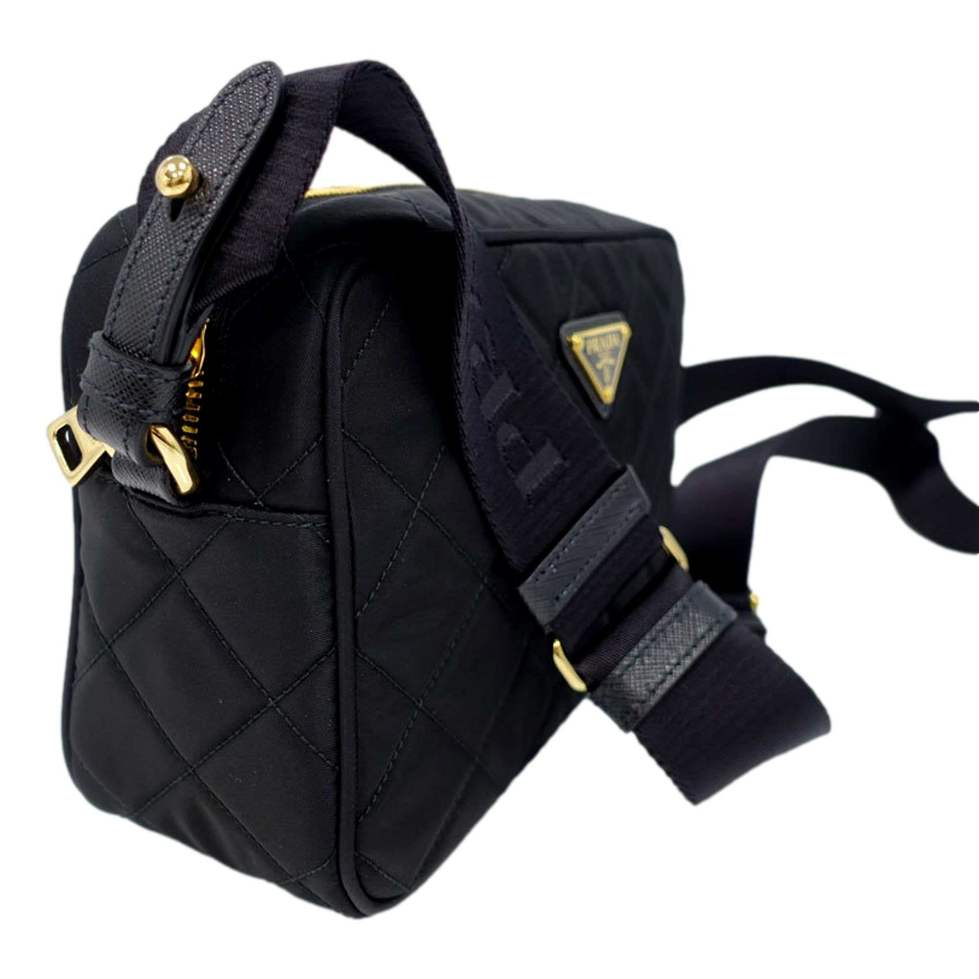 Prada Tessuto Black Quilted Nylon Triangle Logo Camera Crossbody Bag available at Queen Bee of Beverly Hills