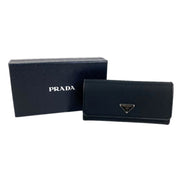 Prada Tessuto Nero Black Continental Flap Black Wallet Silver Triangle Logo available at Queen Bee of Beverly Hills