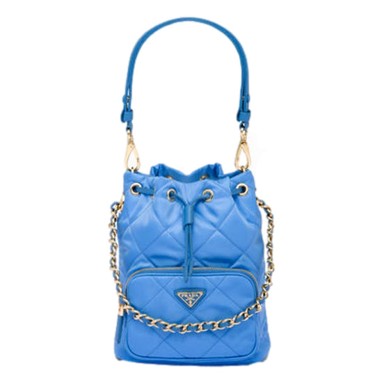 Prada Tessuto Nylon Pervinca Blue Duet Drawstring Quilted Bucket Bag available at Queen Bee of Beverly Hills