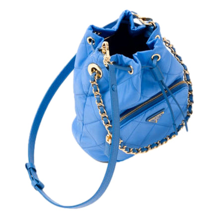 Prada Tessuto Nylon Pervinca Blue Duet Drawstring Quilted Bucket Bag available at Queen Bee of Beverly Hills