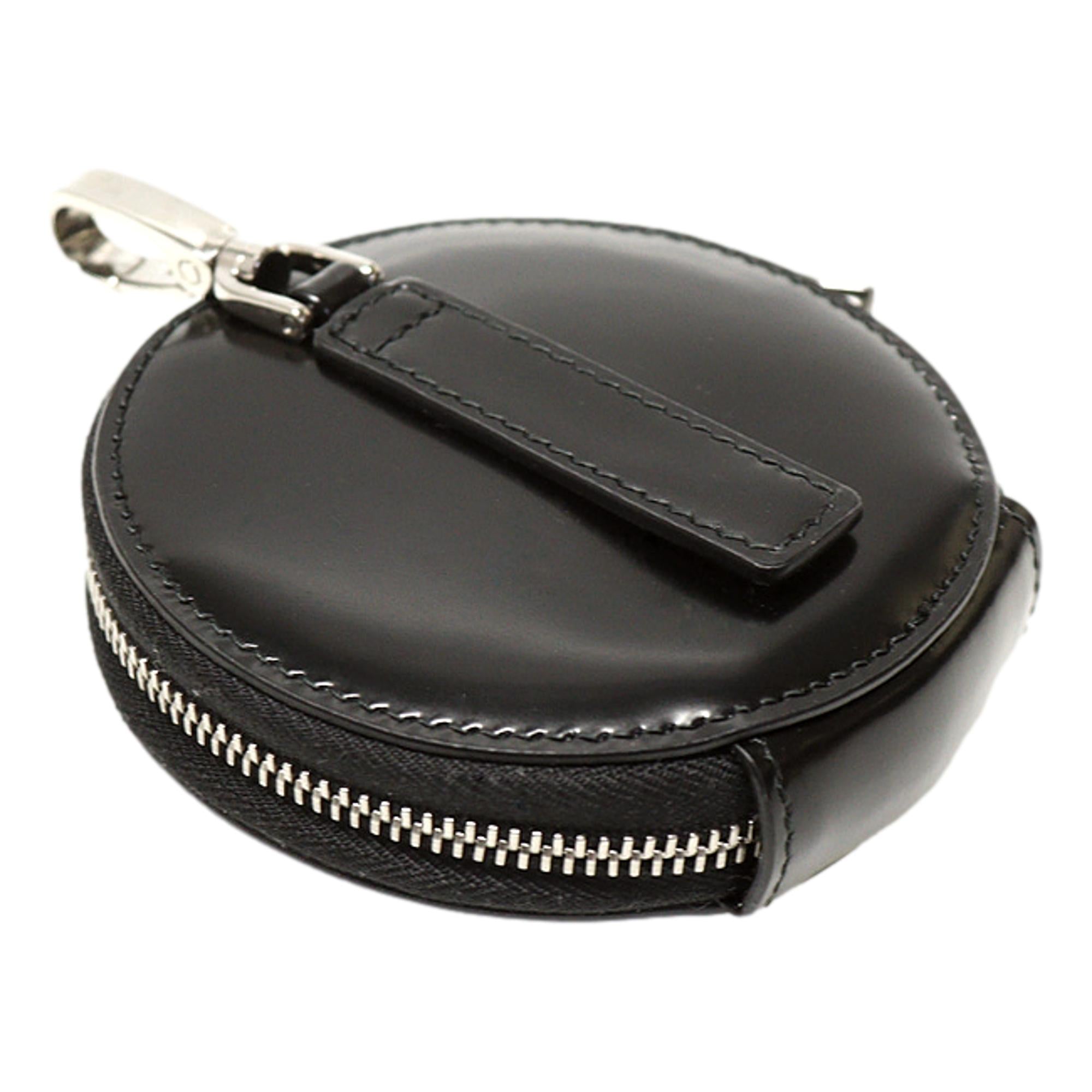 Prada Triangle Plaque Smooth Black Leather Round Mini Pouch Keychain available at Queen Bee of Beverly Hills