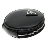 Prada Triangle Plaque Smooth Black Leather Round Mini Pouch Keychain available at Queen Bee of Beverly Hills