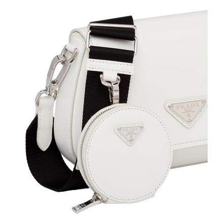 Prada Triangle Plaque Smooth White Leather Round Mini Pouch Keychain available at Queen Bee of Beverly Hills