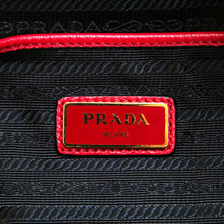 Prada Vitello Daino Convertible Front Pocket Backpack Red Gold Hardware available at Queen Bee of Beverly Hills