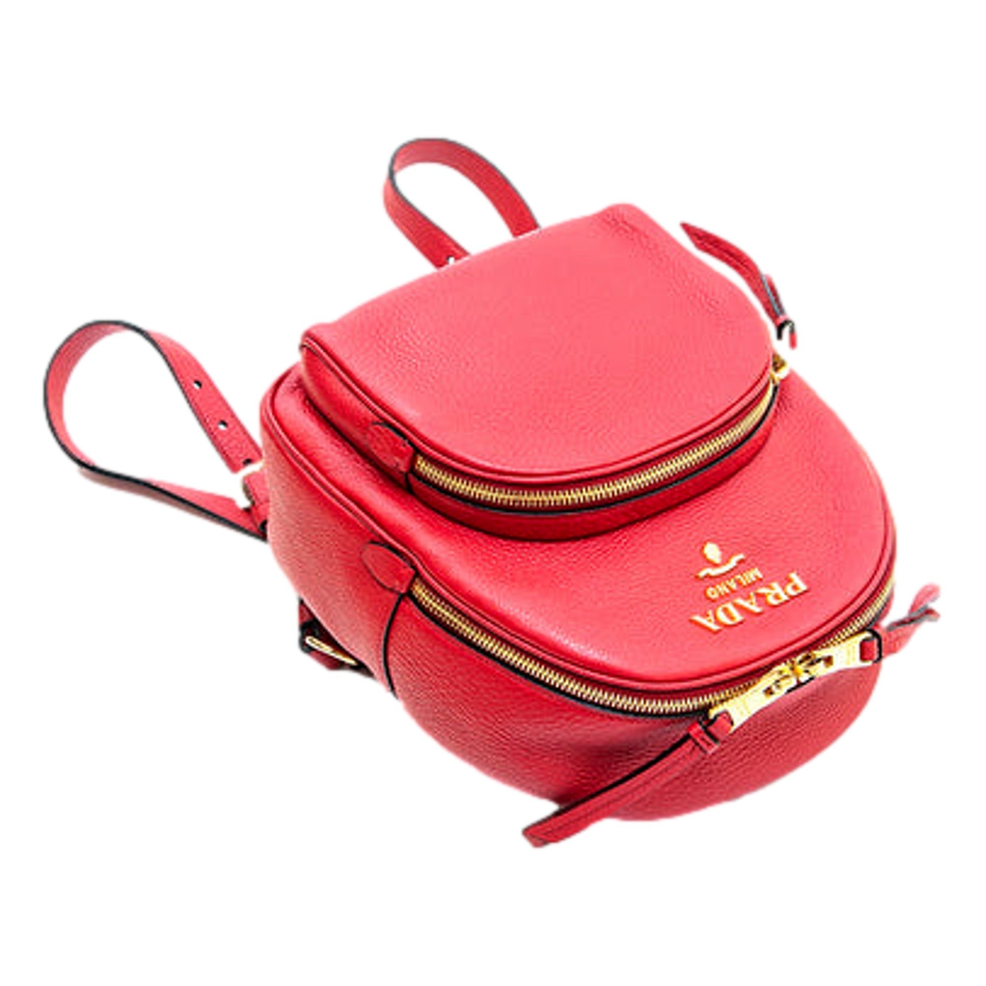 Prada Vitello Daino Convertible Front Pocket Backpack Red Gold Hardware available at Queen Bee of Beverly Hills