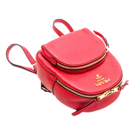 Prada Vitello Daino Convertible Front Pocket Backpack Red Gold Hardware available at Queen Bee of Beverly Hills