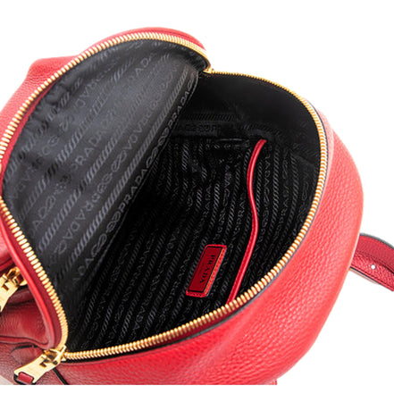 Prada Vitello Daino Convertible Front Pocket Backpack Red Gold Hardware available at Queen Bee of Beverly Hills