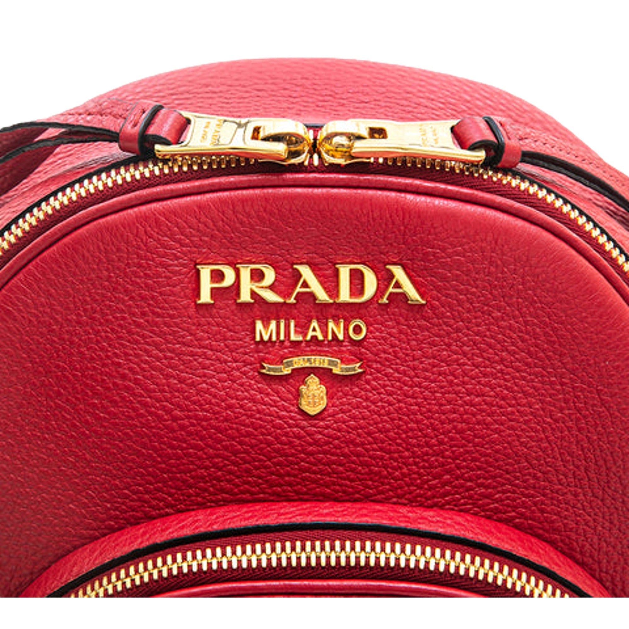 Prada Vitello Daino Convertible Front Pocket Backpack Red Gold Hardware available at Queen Bee of Beverly Hills