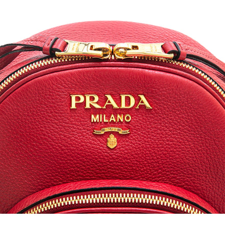 Prada Vitello Daino Convertible Front Pocket Backpack Red Gold Hardware available at Queen Bee of Beverly Hills