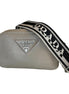 Prada Vitello Daino Leather Sabbia Beige Web Strap Camera Crossbody available at Queen Bee of Beverly Hills