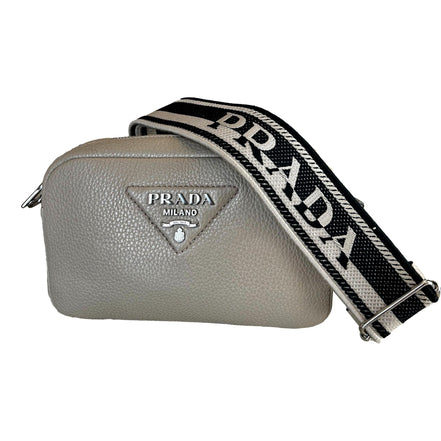 Prada Vitello Daino Leather Sabbia Beige Web Strap Camera Crossbody available at Queen Bee of Beverly Hills