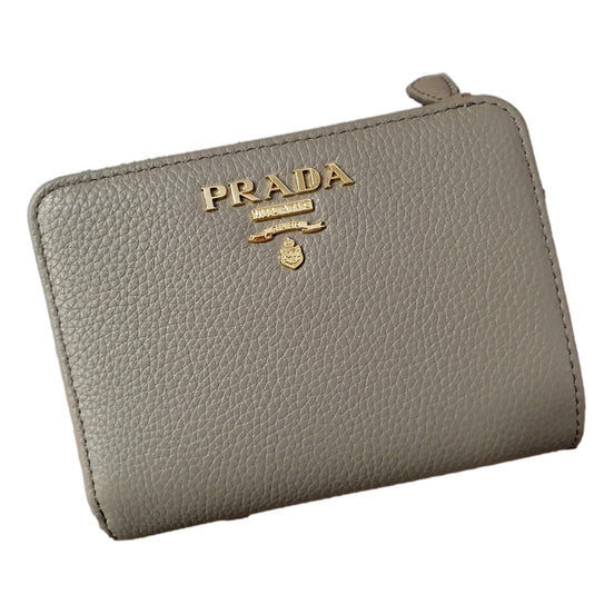 Prada Vitello Grain Argilla Grey Leather Small Wallet with Zipper Gold Plaque Logo available at Queen Bee of Beverly Hills